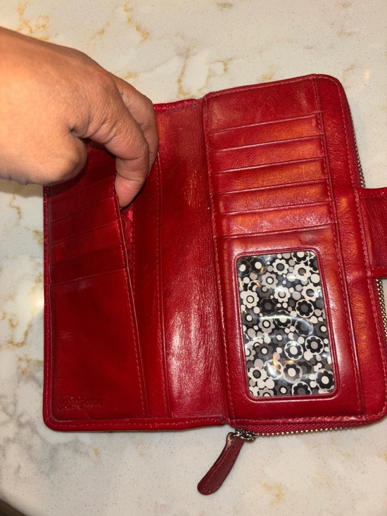 Brighton Red leather wallet featuring a decorative silver-toned snap closure. - Picture 16 of 16